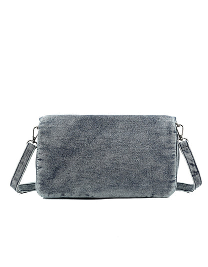 Denim schoudertas met zilverkleurige details