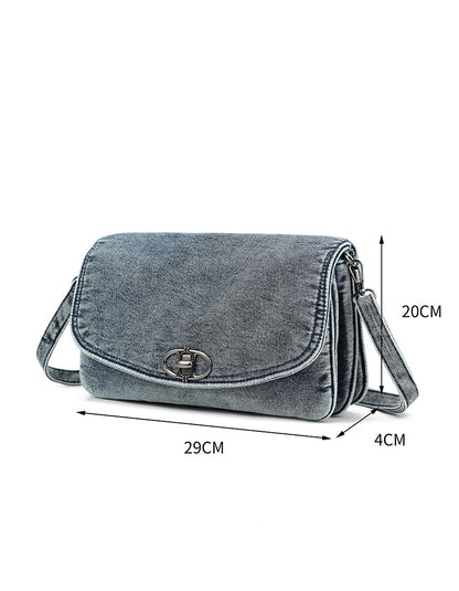 Denim schoudertas met zilverkleurige details